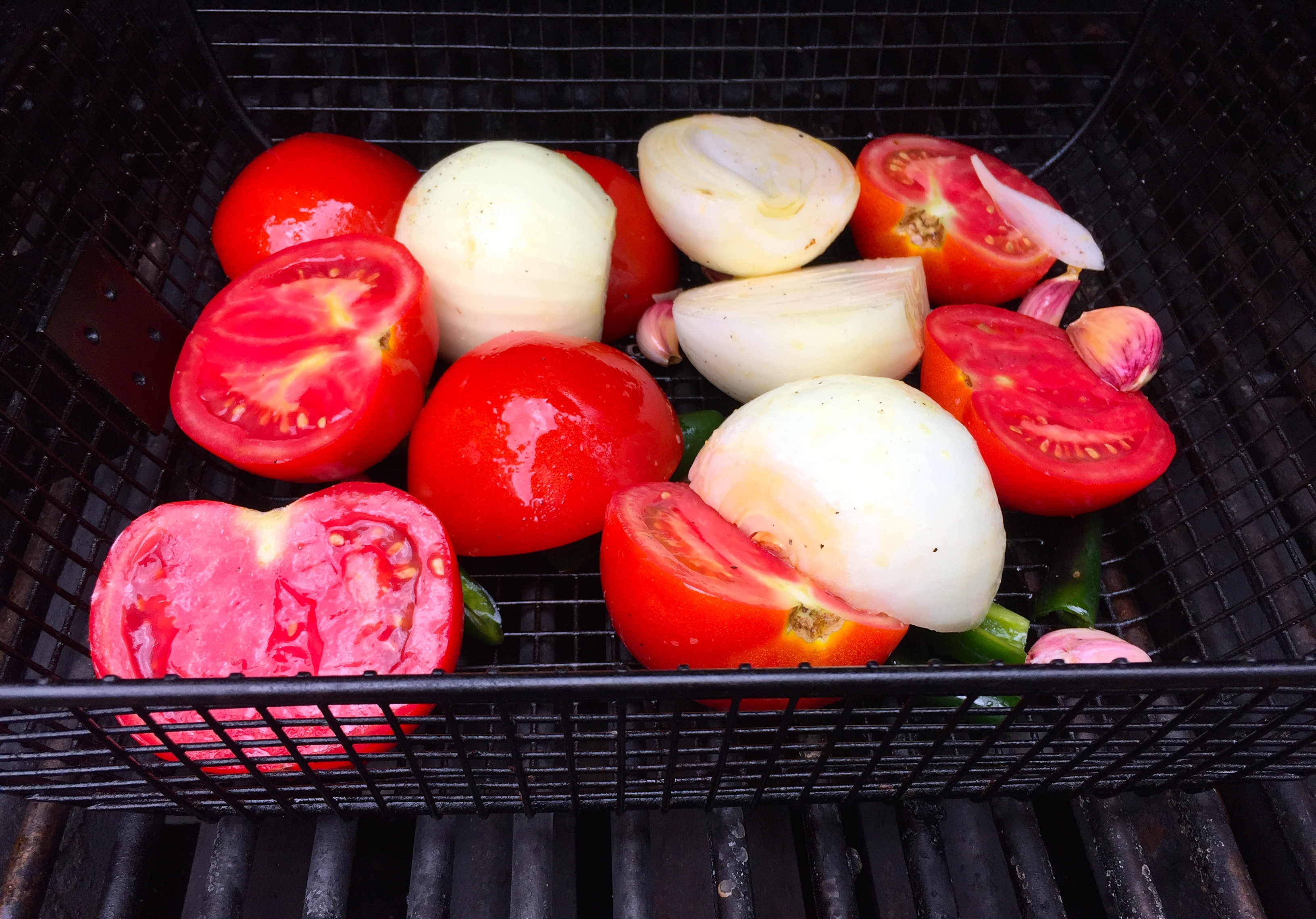 How do you cook vegetables in a grill basket?